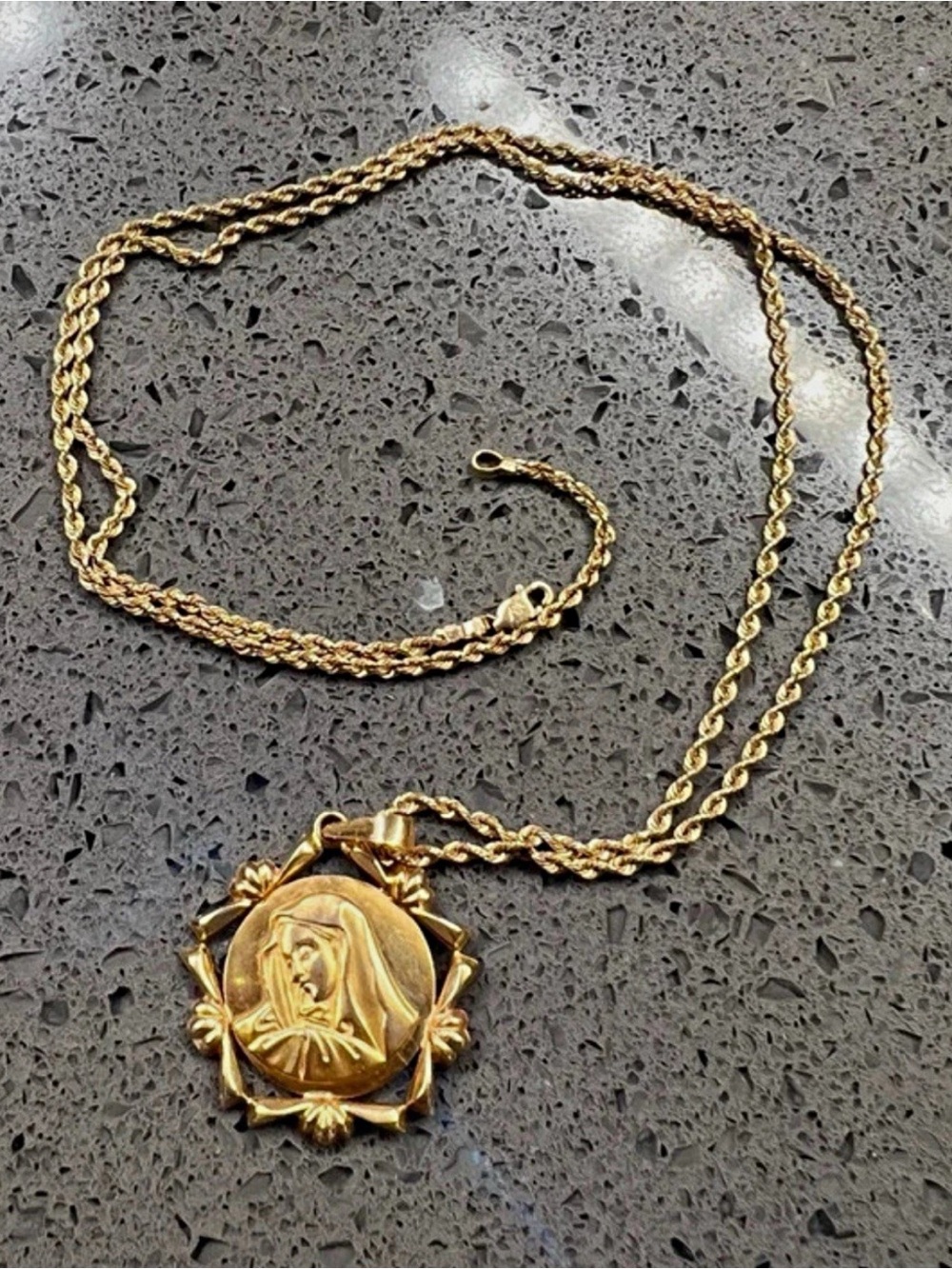 18K Gold Madonna pendant with gold 14K robe chain 22”, 9.4 g